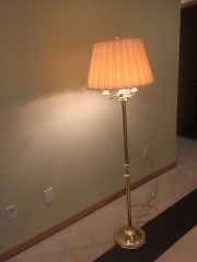 Gold floor lamp with shade