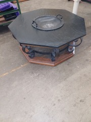OCTAGONAL OAK BASE COFFEE TABLE W\/WROUGHT IRON LEGS, BLACK STONE TOP