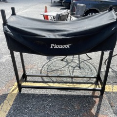 The Woodhaven Pioneer Firewood Rack with Cover
