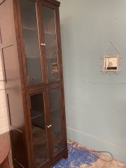 Towering Glass Front Dark Wood Cabinet