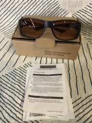 pair of black HD Vision Wrap Arounds Night Vision Glasses with amber lenses.