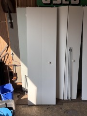 White Slab Bi-Fold Closet Door