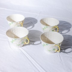 Belleek cups and saucers (set of 4)