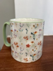 Bella-Flowers with Green Trim mug