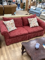 RED SKIRTED CURLED ARM SOFA