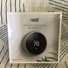 Google Nest Learning Thermostat (3rd Generation) in Stainless Steel.
