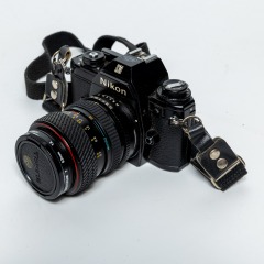 Nikon EM 35mm SLR Film Camera with Tokina Lens 28-70 mm and Canvas Camera Bag