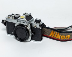 Nikon FM 35mm SLR Camera with Three Lenses