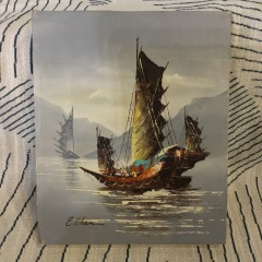 vintage oil on canvas seascape painting featuring traditional Chinese junk boats, signed \