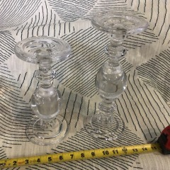 pair of clear glass candlestick holders