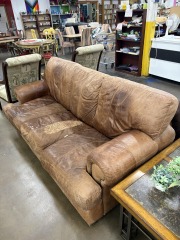 Brown Leather Couch with Paisley Patch