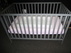Crib, Incudes Mattress and Pad.
