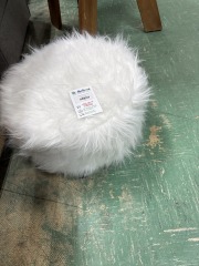 White furry footstool
