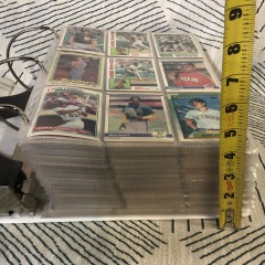 large collection of baseball cards that includes various years and brands