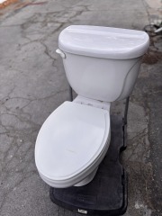 6.0 Lpf\/1.6 gpf American Standard Toilet