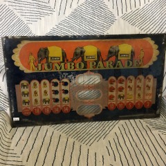 vintage reel glass panel from a Mills Jumbo Parade slot machine