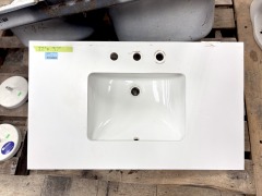 White Stone Countertop and Sink