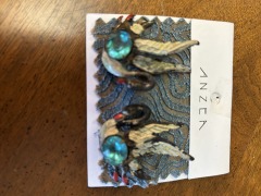 Two vintage swan pins