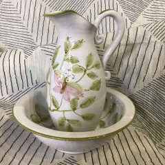 hand-painted ceramic pitcher and basin sets featuring floral designs Italy
