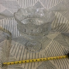 This vintage centerpiece resembles an EAPG Arizona comport by Duncan's Sons from around 1895, featuring a scalloped rim and a pressed glass pattern