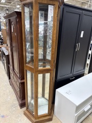 Curio lighted with glass shelves