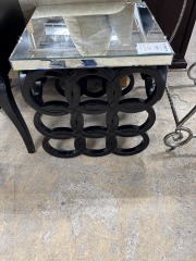 mirror and black end table