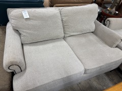 Tan 2 Cushion Loveseat