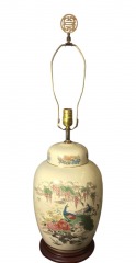 Vintage chinoiserie-style porcelain ginger jar lamp features a colorful peacock