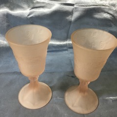 frosted pink glassware resembles vintage Tiara chalices or goblets
