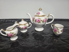 Partial vintage porcelain tea service