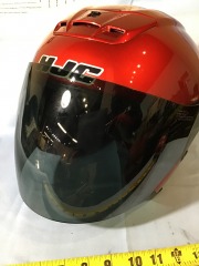 HJC motorcycle helmet features a vibrant red finish and a tinted visor, size S