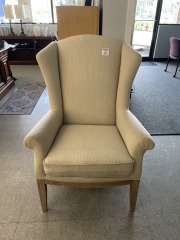 Cream wingback chair