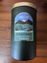 Candle-lite Mountains 19.25oz candle Msrp$16.99