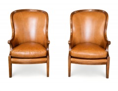 Elegant Pair of tan leather armchairs