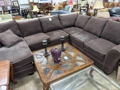 Brown Sectional Sofa with tan piping