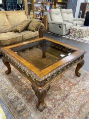 Stately Ornate Wood Smoke Glass Coffee Table