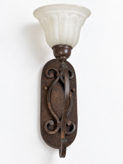 Mottled bronze scroll wall sconce