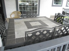 Wrought Iron Table With 8 Chairs And Umbrella Stand.